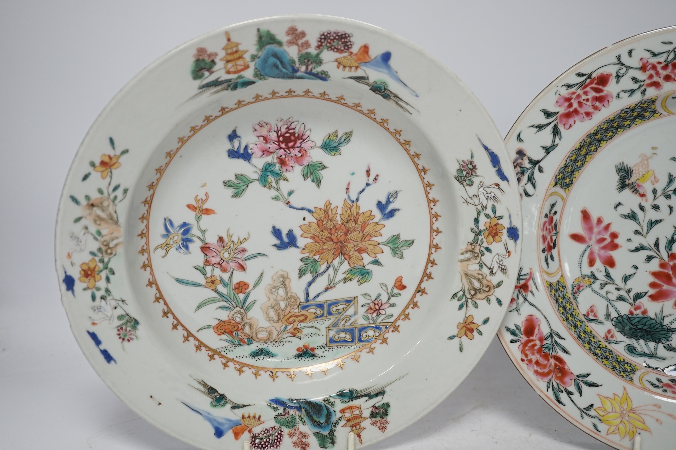 Two Chinese famille rose porcelain plates, mid 18th century, largest 23cm diameter